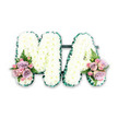A thoughtfully designed floral tribute spelling MA in capital letters is displayed against a bright white background, its simplicity allowing every petal and ribbon fold to stand out clearly. The letters, likely around 18 to 24 inches tall, are completely covered in compact white chrysanthemums arranged so closely that they form a thick, pillow-like surface. Their many small petals catch the light softly, giving the tribute a gentle, clouded appearance that feels peaceful and pure. Tracing the outer edges of both the M and the A is a deep green, satin-finished ribbon, carefully pleated and pinned to create a delicate frill. This contrasting border frames the white flowers, defining the shape of each letter and adding a smart, almost tailored finish, reminiscent of neat garden borders on the residential streets surrounding Queensway in Petts Wood. At the lower left of the M and the lower right of the A, two coordinated accent sprays introduce soft, romantic colour. In each spray, blush-pink and lilac roses bloom alongside small pink spray roses, their layered petals offering depth and subtle variation in tone. A single fern frond emerges from the base of each cluster, its airy greenery adding lightness and a touch of the natural woodland character that locals associate with the area's green spaces. The tribute's calm white palette and gentle pastels evoke love, respect, and gratitude, making it particularly suited to a funeral or memorial for a mother whose initials or family nickname are captured by MA. It is the kind of customised arrangement that a family might arrange for delivery from a trusted Petts Wood florist, to honour a life with understated beauty and deep feeling.